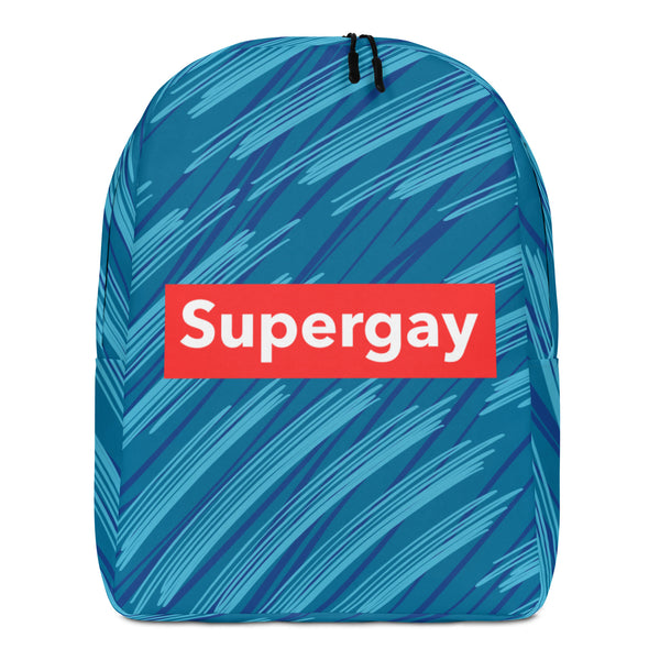 Front view of a blue patterned backpack with a red patch reading “Supergay”