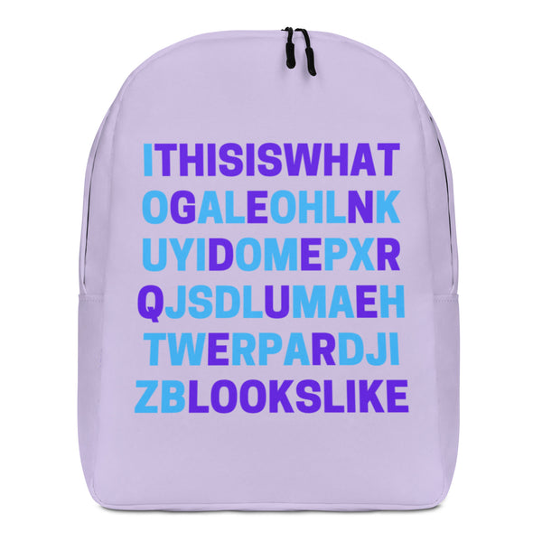 Front view of a lavender backpack with blue and purple text reading “This is what genderqueer looks like”