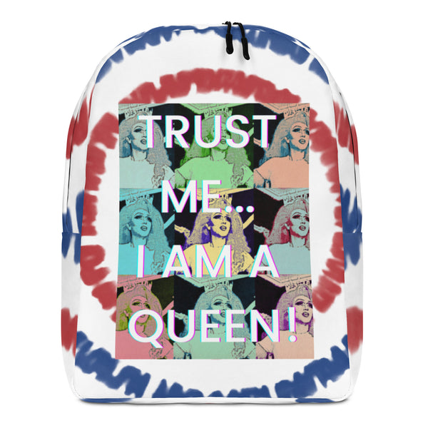 Front view of a white tie-dye backpack reading “TRUST ME... I AM A QUEEN!”