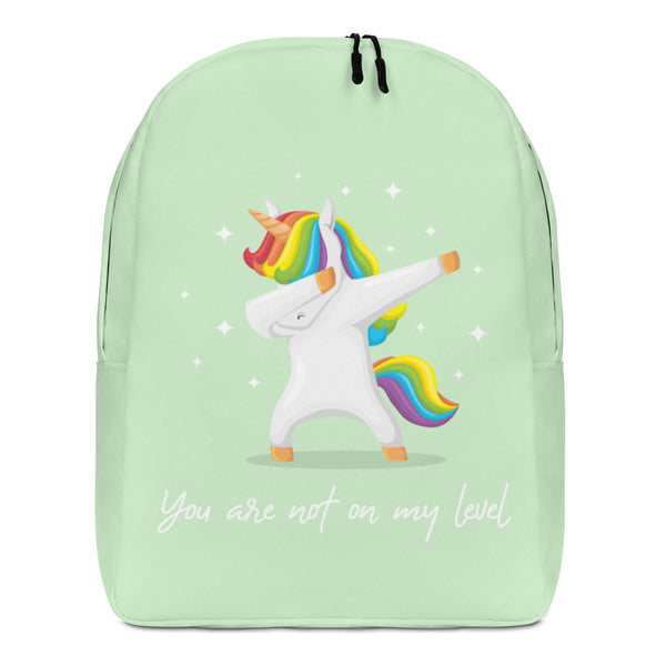 Front view of a mint green backpack with a dancing rainbow-maned unicorn and white text reading “You are not on my level.”