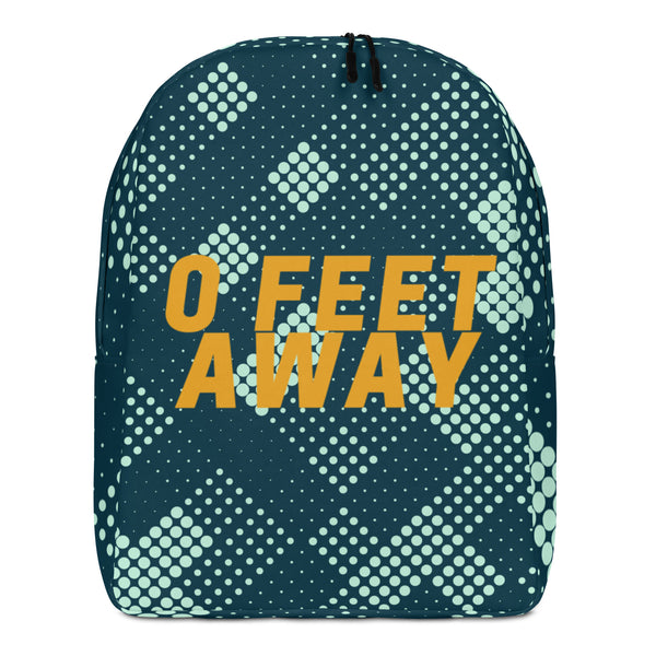 Front view of a dark teal backpack reading “0 FEET AWAY” in orange
