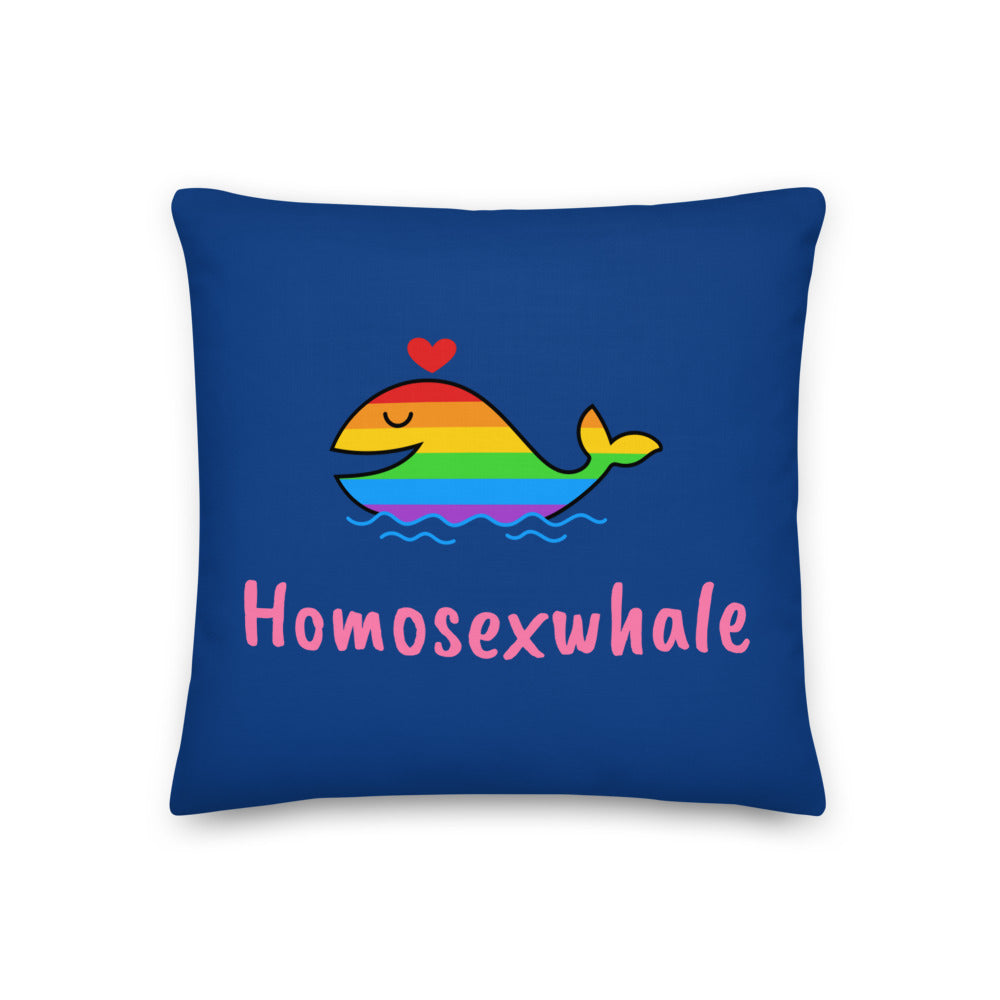 Blue pillow with a rainbow whale, red heart, and pink “Homosexwhale” text