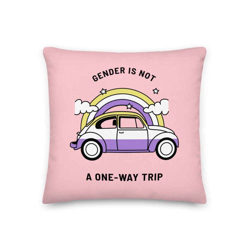 Pink square pillow with a rainbow car graphic and the slogan “Gender Is Not a One-Way Trip”