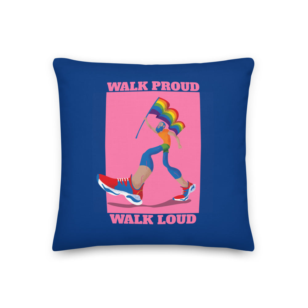 Navy square pillow with pink “WALK PROUD WALK LOUD” text and a rainbow flag marcher