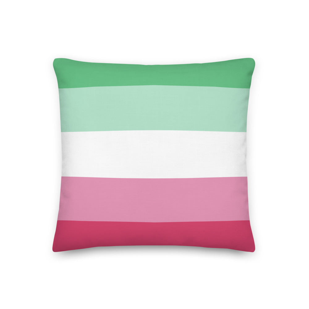 Square pillow with horizontal green, white, pink, and magenta stripes
