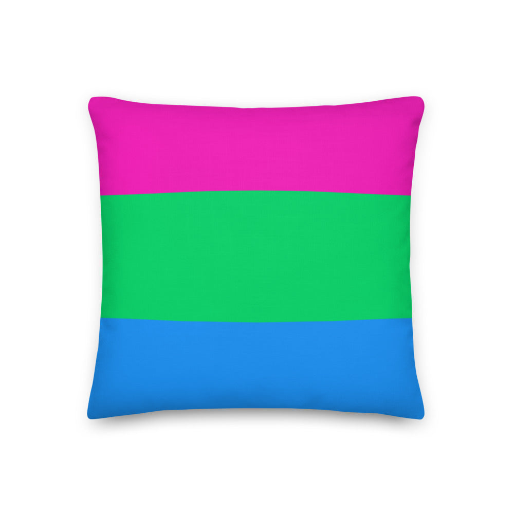 Square pillow with horizontal magenta, green, and blue stripes on a white background