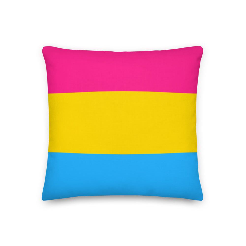 Square pillow with horizontal pink, yellow, and blue stripes on a white background