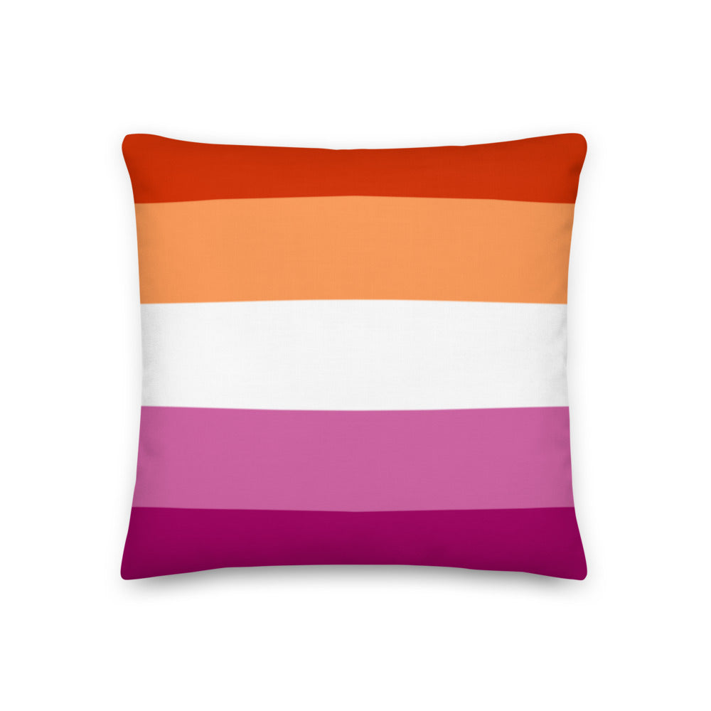 Square pillow with horizontal orange, white, pink, and magenta stripes