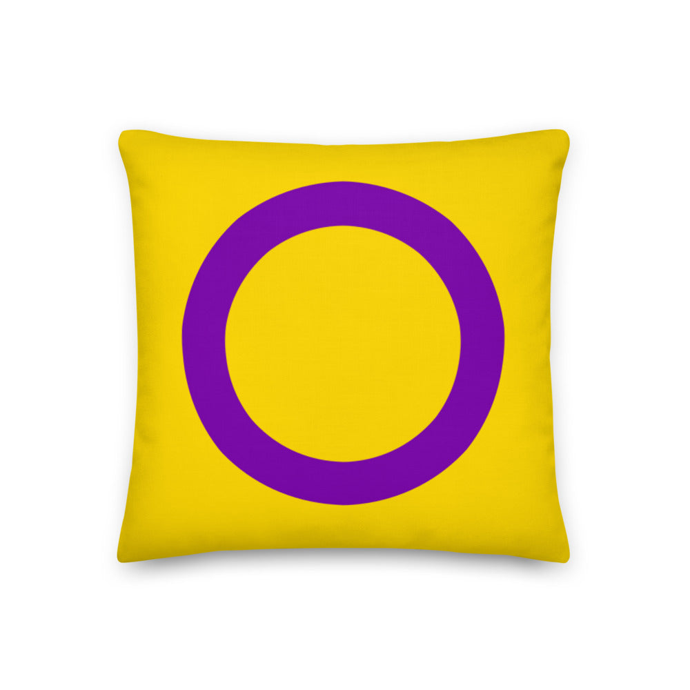 Front-facing yellow square pillow with a large purple intersex symbol