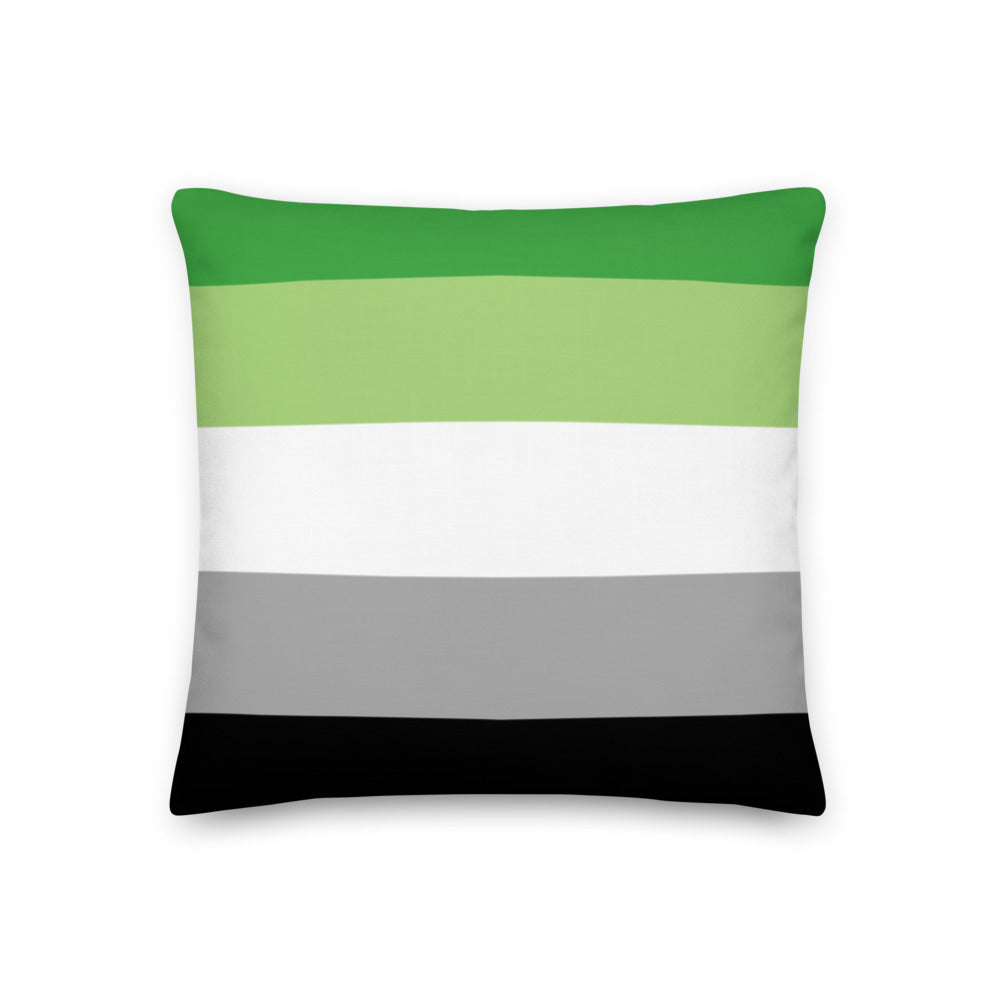 Square pillow with horizontal green, light green, white, gray, and black stripes