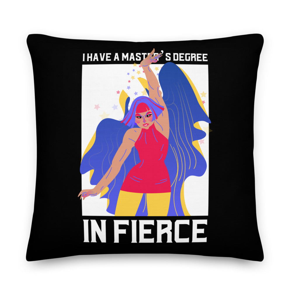 Black pillow reading “I HAVE A MASTER’S DEGREE IN FIERCE,” with a colorful illustrated woman