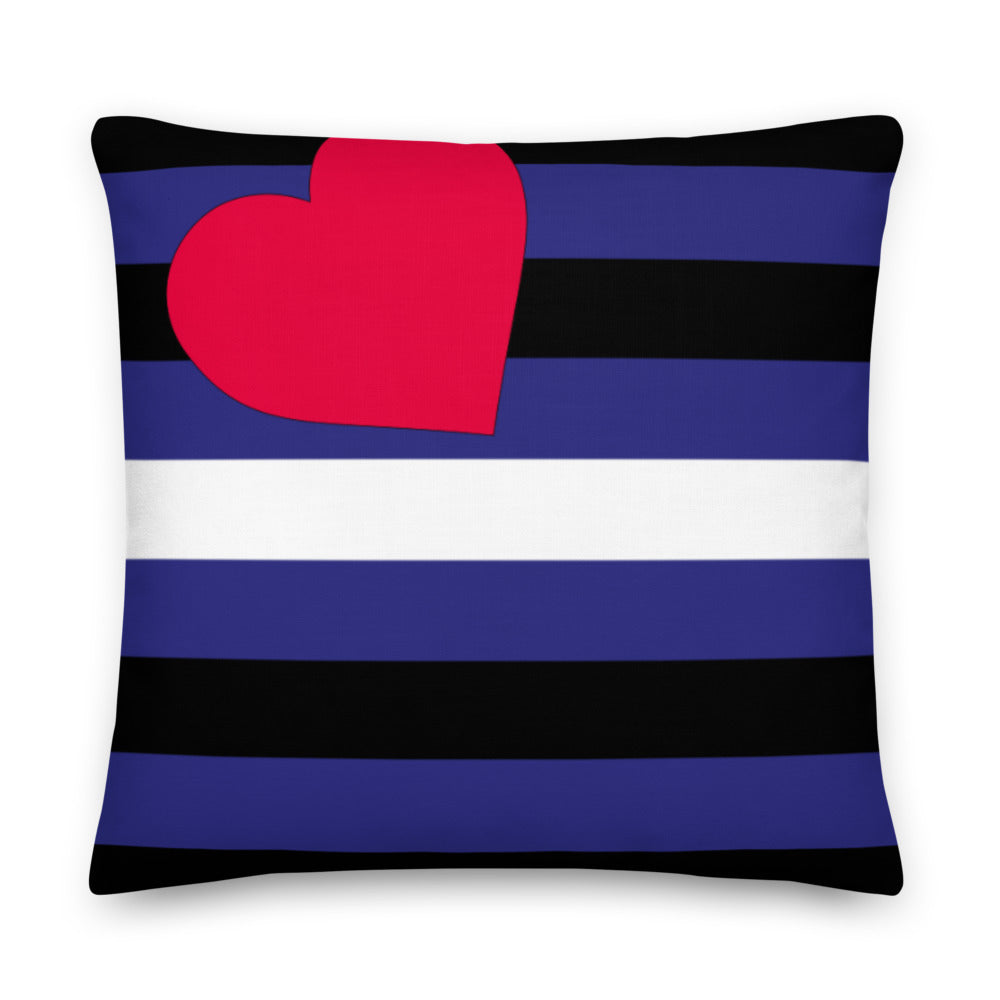 Square pillow with black, blue, and white leather pride stripes and a pink heart
