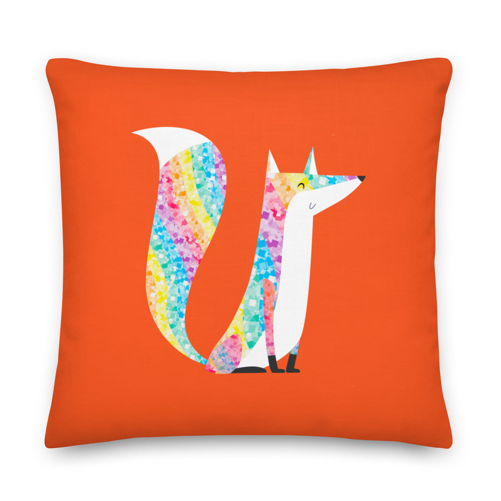 Square orange pillow featuring a colorful glitter-style fox illustration