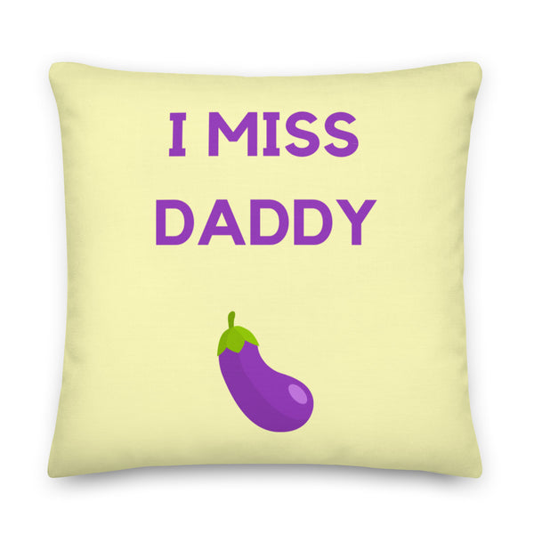 Pale yellow square pillow reading “I MISS DADDY” with a purple eggplant graphic