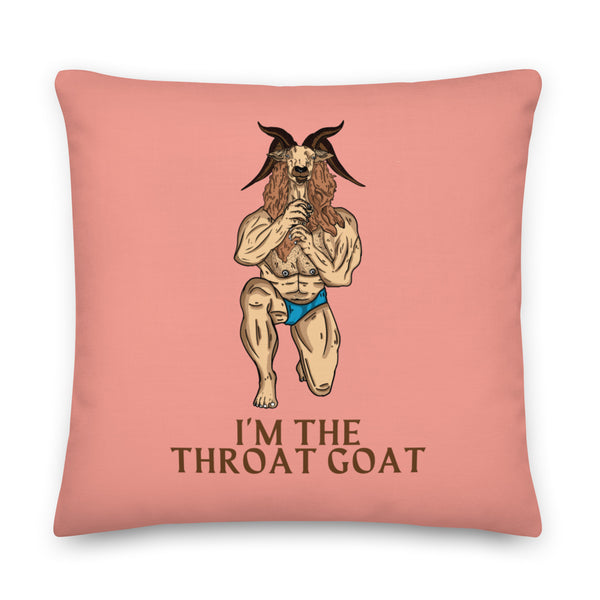 Front view of a pink pillow with a muscular goat in blue briefs and “I’M THE THROAT GOAT” text