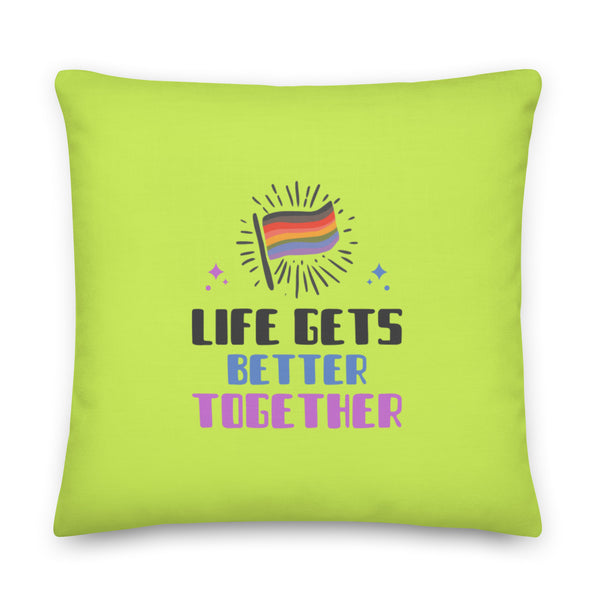 Lime-green square pillow reading “LIFE GETS BETTER TOGETHER,” with a rainbow flag graphic