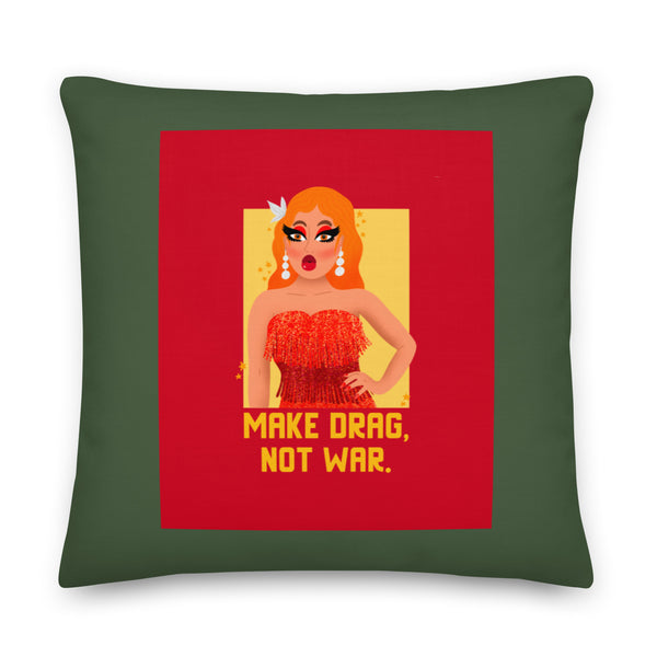 Dark green pillow with a drag performer graphic and the words “MAKE DRAG, NOT WAR.”