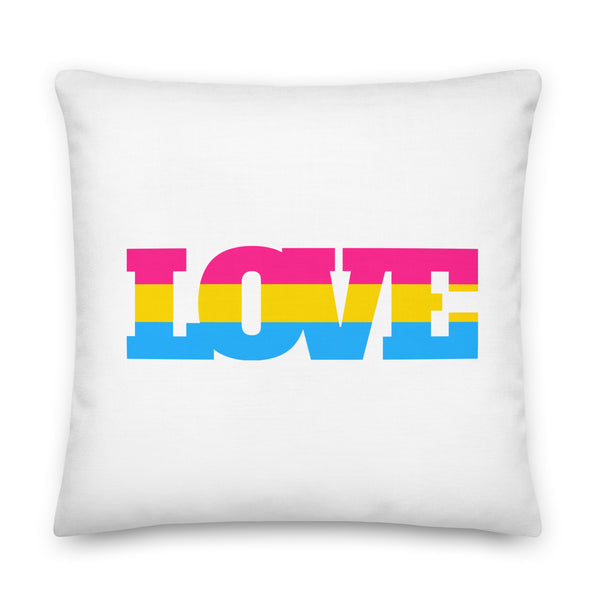 Front-facing white square pillow with bold pink, yellow, and blue LOVE lettering