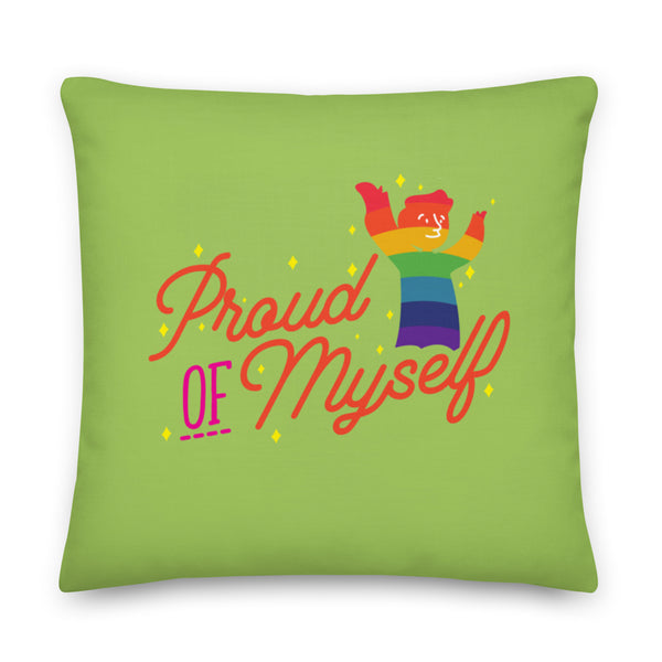 Green square pillow reading “Proud OF Myself,” with a rainbow-striped cheering figure and stars