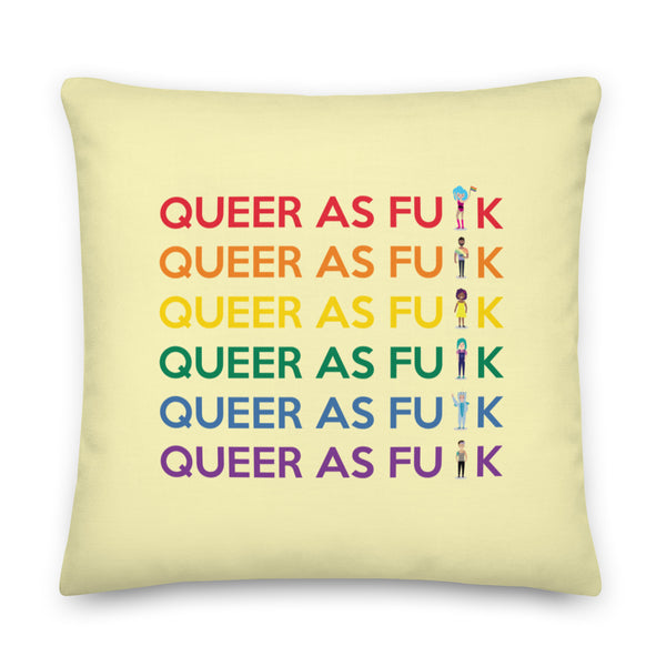 Pale yellow square pillow reading “QUEER AS FU⚑K” in six rainbow-colored rows