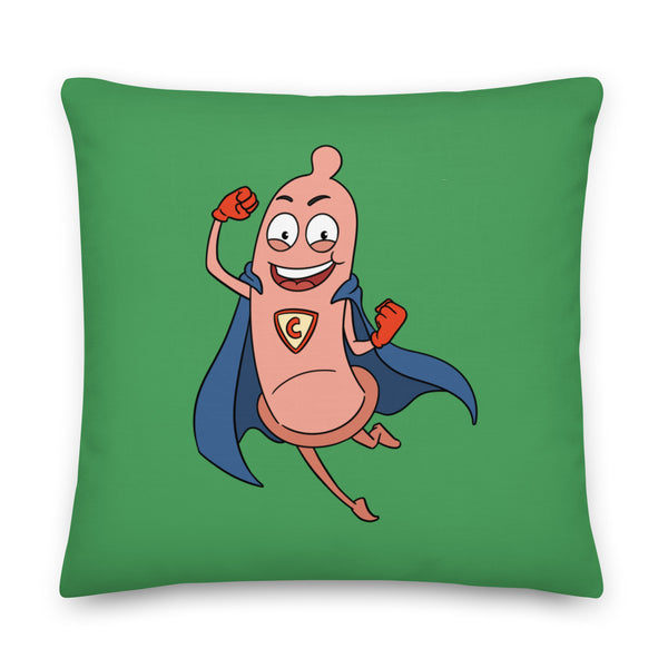 Square green pillow featuring a smiling cartoon condom superhero with a blue cape