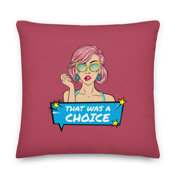 Square dusty-rose pillow with a cartoon woman and “THAT WAS A CHOICE” speech bubble