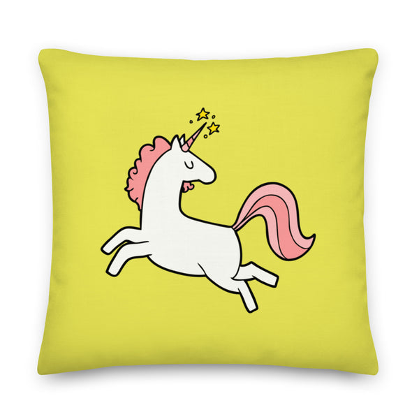 Square lime-green pillow with a white, pink-maned unicorn leaping across it