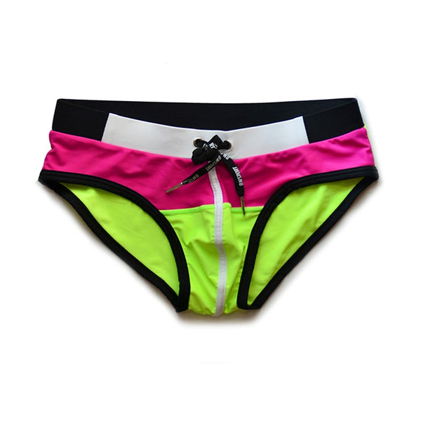 Front view of neon pink and lime green swim briefs with black trim and drawstring