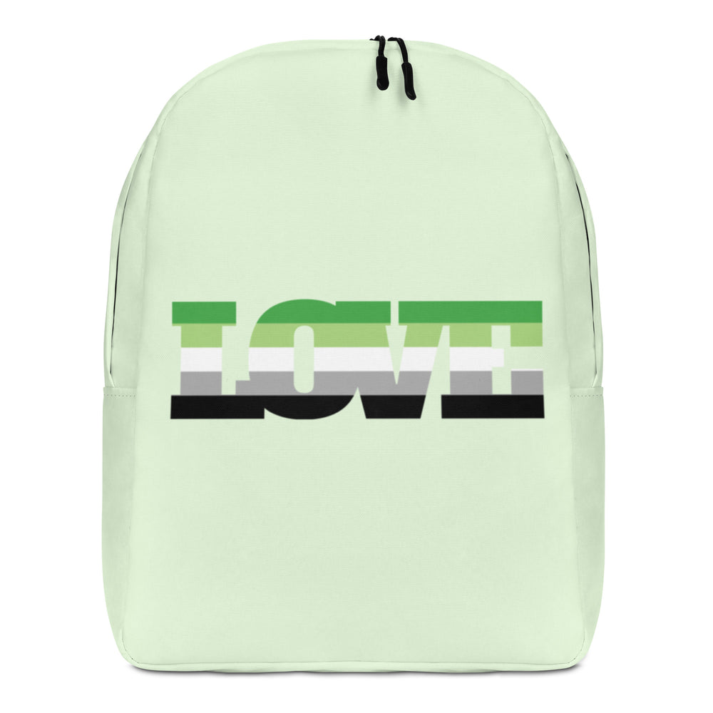 Front view of a pale green backpack with a large green, white, gray, and black graphic