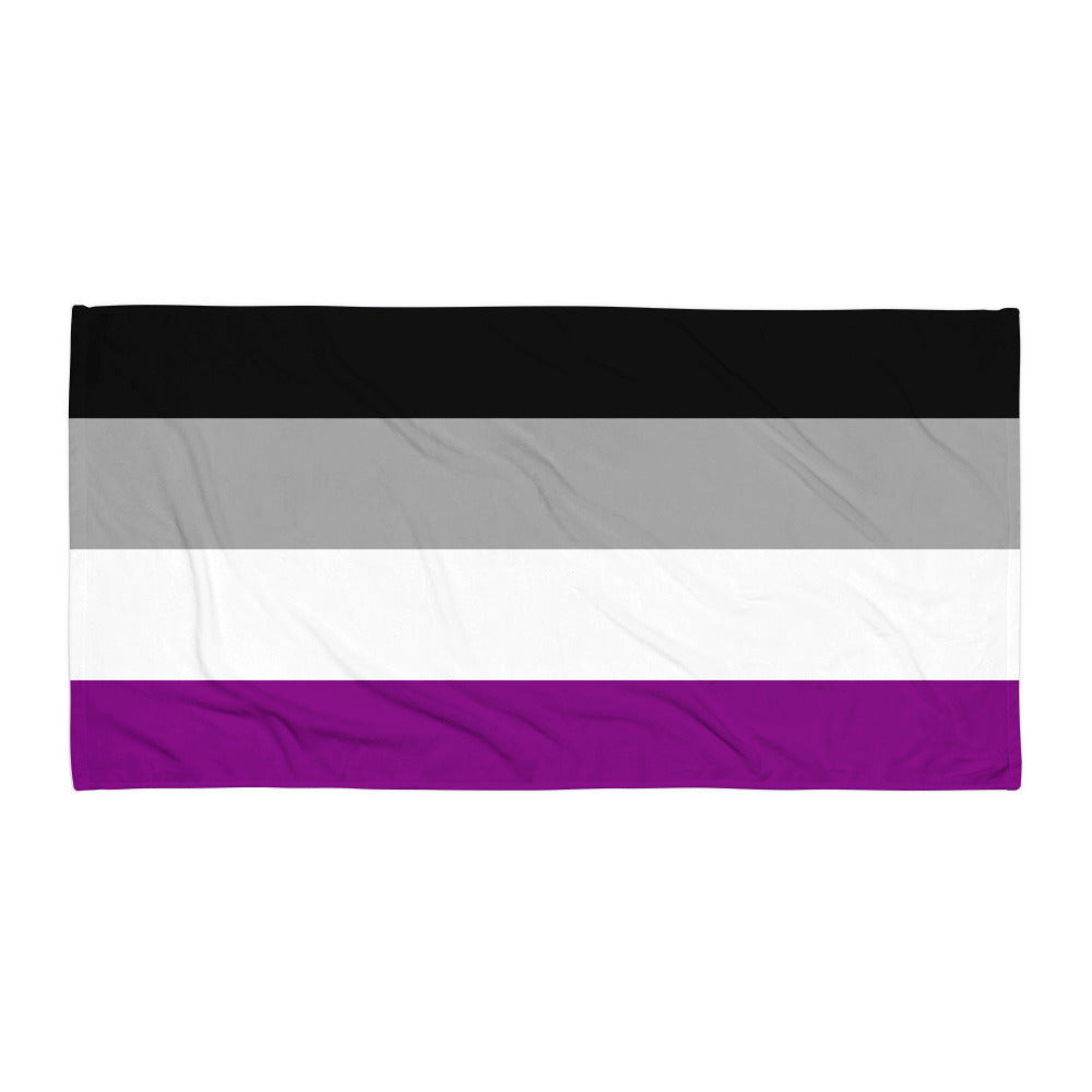 Flat beach towel with horizontal black, gray, white, and purple stripes