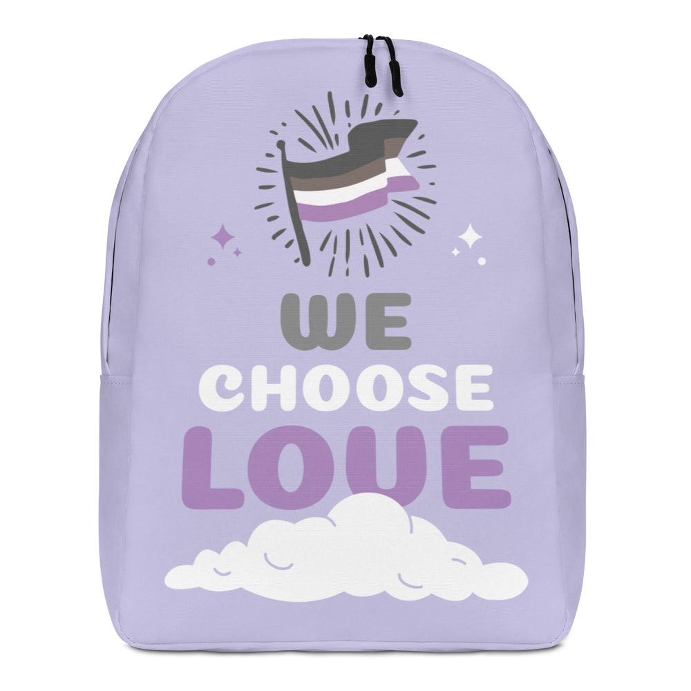 Front view of a lavender backpack reading “WE CHOOSE LOVE,” with a striped top hat and cloud