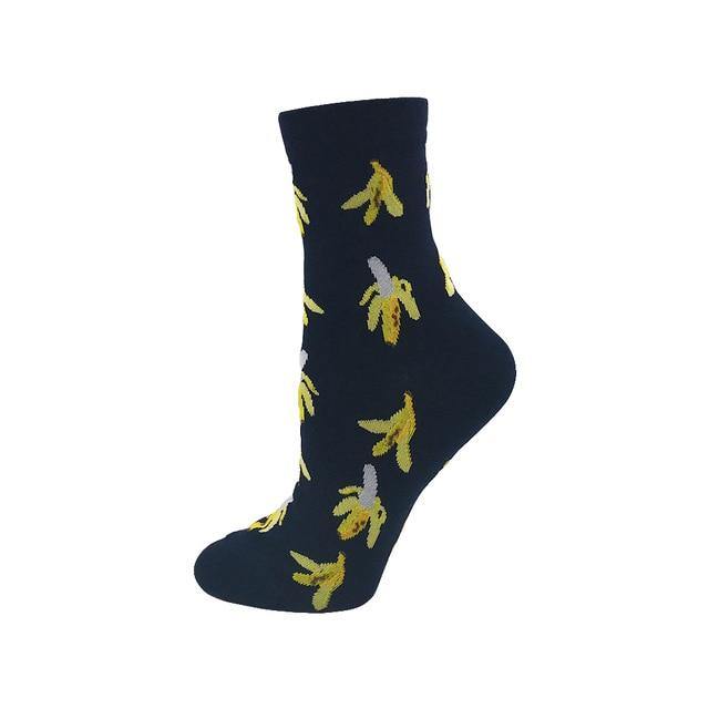 Black crew socks covered in yellow banana prints