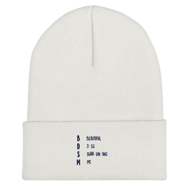Front view of a white cuffed beanie with blue BDSM lettering and acronym text