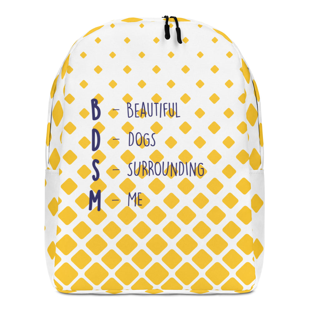 Front view of a white backpack with yellow diamond pattern and “BDSM” dog-themed text