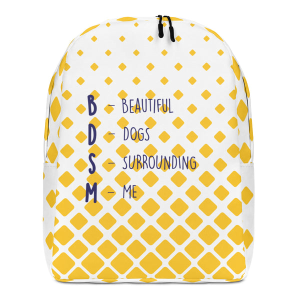 Front view of a white backpack with yellow diamond pattern and “BDSM” dog-themed text