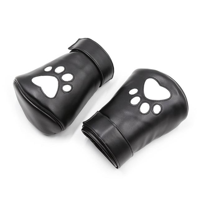 Black faux-leather pup-play bondage handcuffs with paw-print cutouts