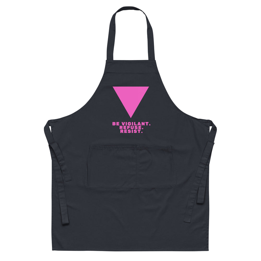 Front view of a black apron with a pink inverted triangle and “BE VIGILANT. REFUSE. RESIST.”