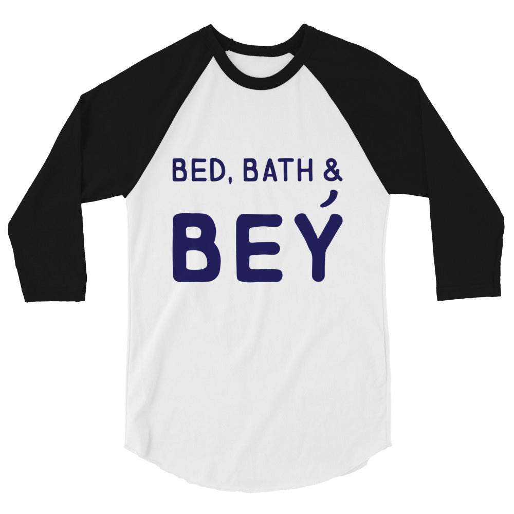 Front view of a white and black raglan shirt reading “BED, BATH & BEY”