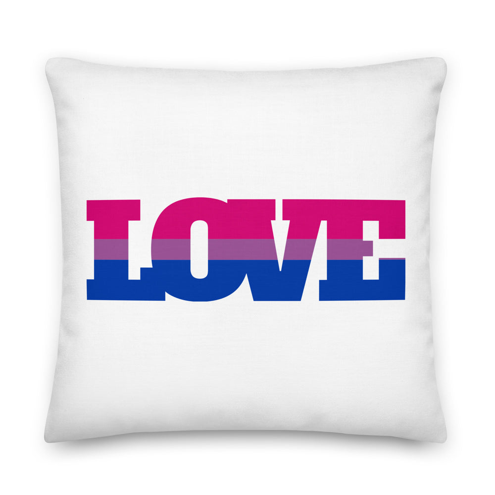 White square pillow with large pink, purple, and blue “LOVE” graphic