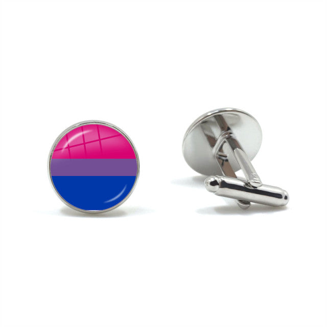Pair of silver cufflinks, one showing the pink, purple, and blue bisexual pride flag