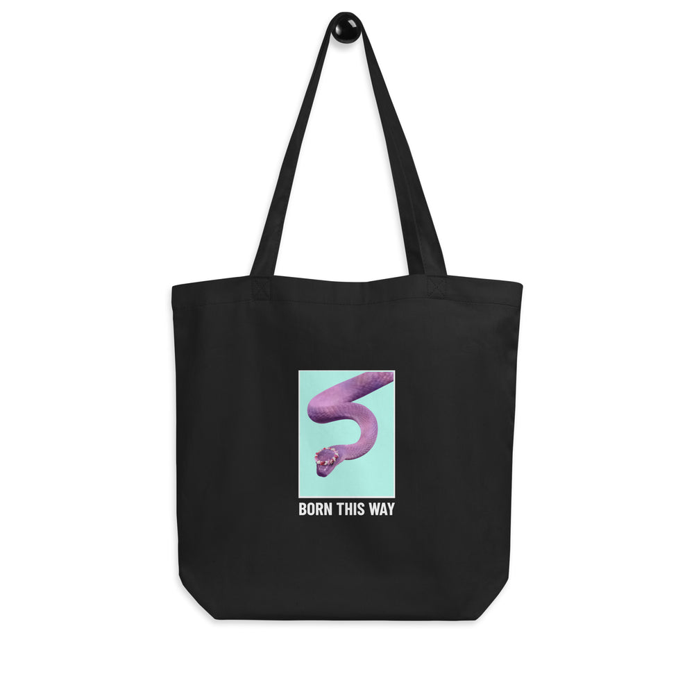 Front view of a black tote bag with a purple snake graphic and “BORN THIS WAY” text