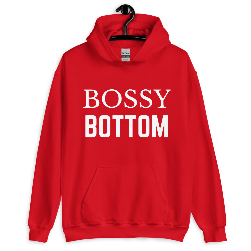 Front-facing red pullover hoodie with white “BOSSY BOTTOM” text and a kangaroo pocket