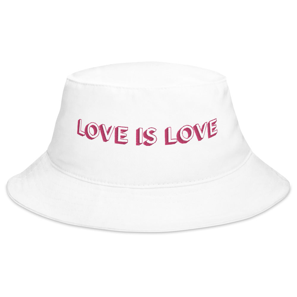 White bucket hat with pink “LOVE IS LOVE” lettering on the front