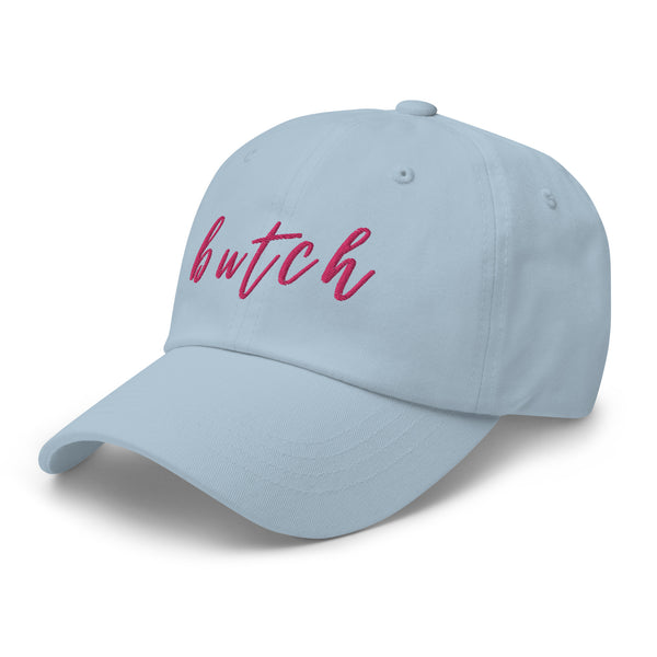 Light blue baseball cap with pink embroidered “butch” lettering, shown at an angle