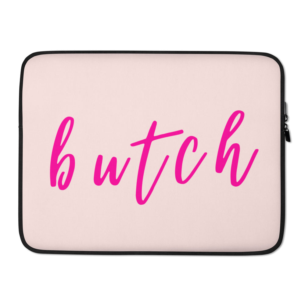 Front view of a pale pink laptop sleeve with black trim and pink “butch” script lettering