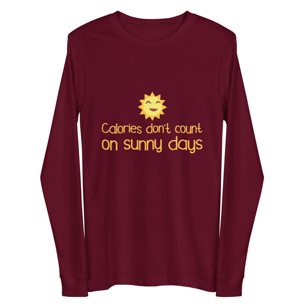 Front view of a maroon long-sleeve shirt with a smiling sun and “Calories don’t count on sunny days”