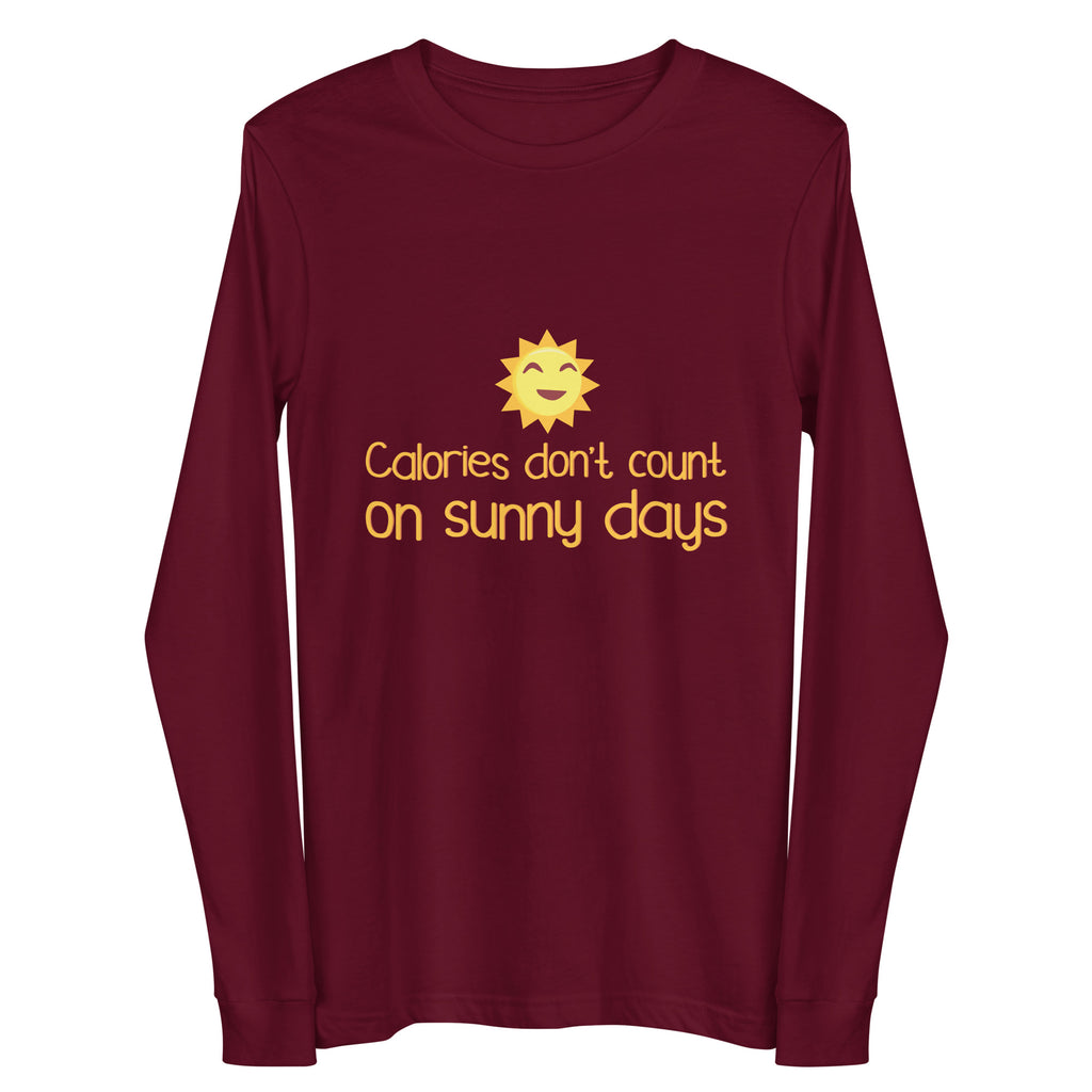 Front view of a maroon long-sleeve shirt with a smiling sun and “Calories don’t count on sunny days”