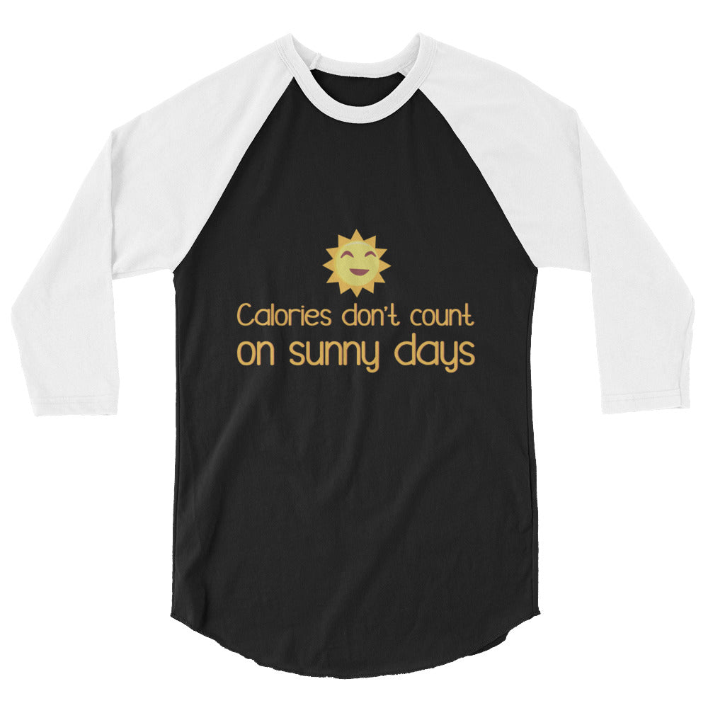 Front view of a black-and-white raglan shirt reading “Calories don’t count on sunny days”