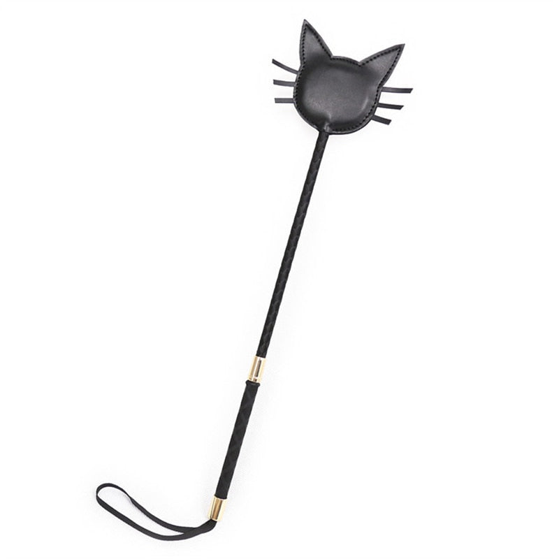 Black cat-shaped leather spanking paddle with a long handle and wrist loop