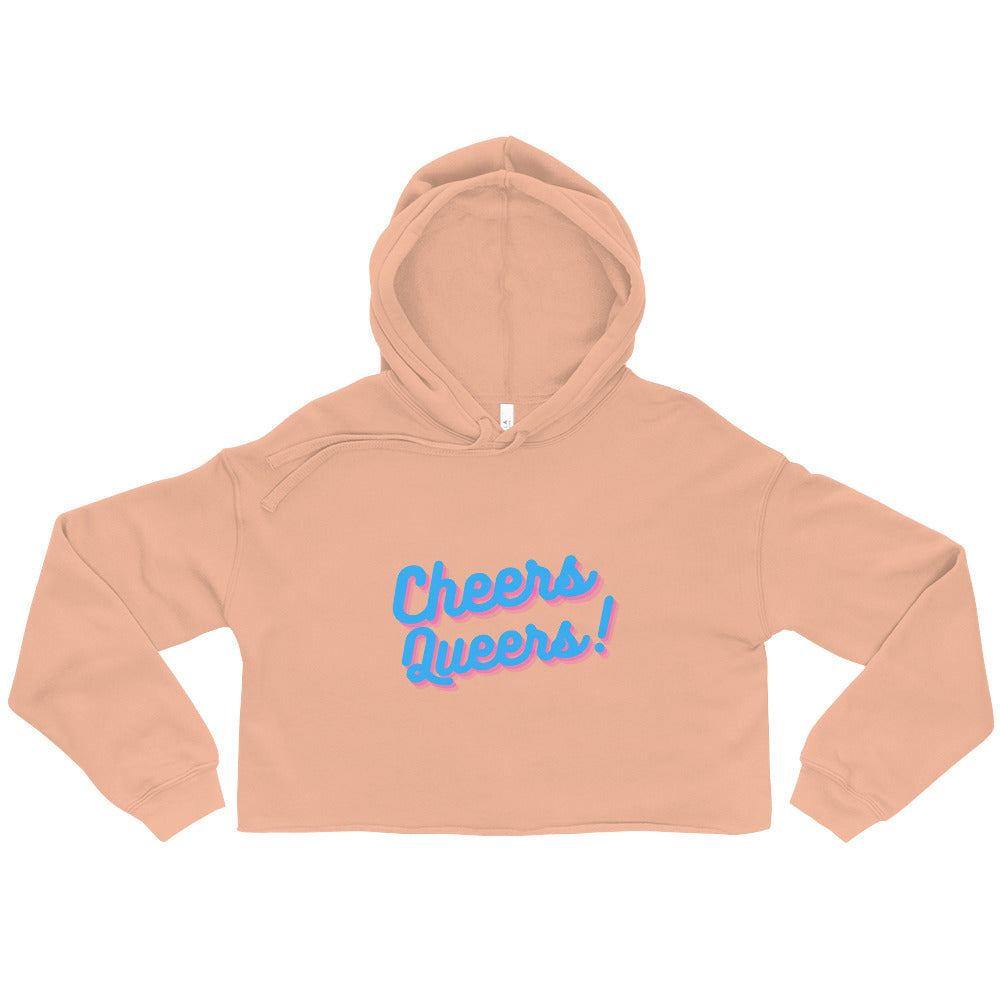 Peach cropped hoodie laid flat with blue-and-pink “Cheers Queers!” text